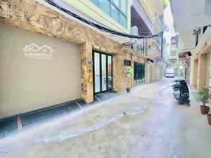 phân lô hoàng cầu - sau quận uỷ đống đa - 6 tầng thang máy - gara ô tô - kinh doanh đỉnh