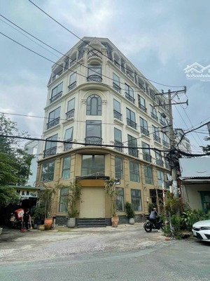 nhà đẹp - giá tốt! góc 2 mặt tiền phổ quang (7x26m), hầm 5 tầng, hđt 110tr/tháng