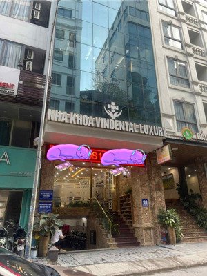 mp trần quốc vượng - 9 tầng thang máy - 1 mặt phố 1 mặt ngõ ô tô - dòng tiền 350tr/tháng.