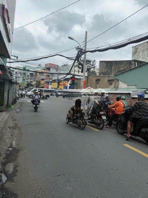 nhà mặt tiền đặng nguyên cẩn p14, q6 siêu đông đúc giá 11tr