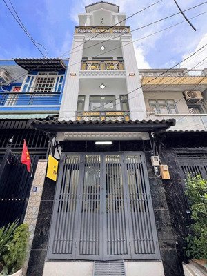 nhà 3 tầng mới đẹp sân thượng trước sau shr cầm tay.