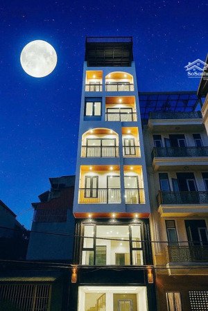 nhà phố hoàng mình đạo 8tầng thang máy - gara oto full nội thất - đối diện tâm anh