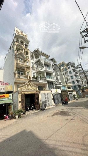 mặt tiền dương quảng hàm- p5, gv -tiện kinh doanh buôn bán- dt: 70m2- 6 tầng lầu gồm 8pn- giá 13tỷ8