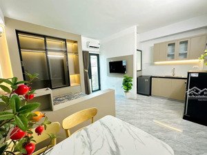 bán chung cư mini hào nam, đống đa, 65m2*7t, 13 phòng, 2 thoáng trước sau, xây mới, tm, dt 75tr/th