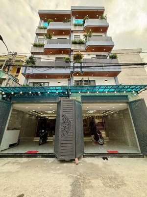 nhà bên trường học, đường trần thị năm, dt; 4,5x12m, lửng, 3lầu, 4pn, gara ô tô, dân thượng