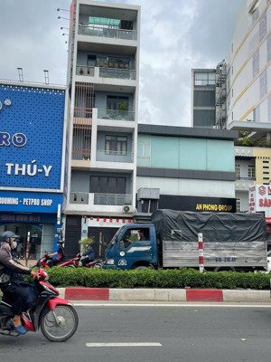 siêu phẩm mt hồ văn huê, q phú nhuận - dt: 5,5x15m - hầm 5 tầng - hđt: 80tr/th - giá 24 tỷ