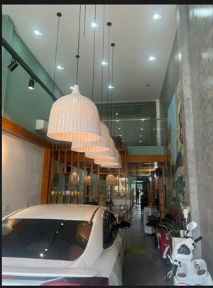 nhà mặt tiền kinh doanh sầm uất ngay chợ hạt điều q12 chưa tới 100tr/m2