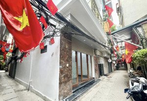 bán nhà mới đẹp- lô góc- thang máy ngõ thông gần trần quốc hoàn, phạm văn đồng ngõ thông :50m x6t