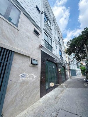 bán nhà 4 tầng xây mới, hẻm oto thông toàn biệt thự. ngay nơ trang long -lê quang định