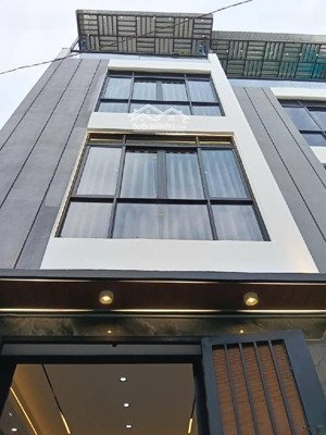 nhà mới xây dt gần 57m2 4 tầng 4pn có thang máy phạm văn chiêu phường 16 gv