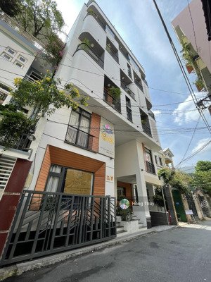 bán tòa chdv mặt tiền ngay trường sơn 1 hầm 6 lầu đct 200tr/th giá 45 tỷ khu sân bay