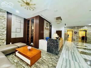 Hạ 5 tỷ nhà Lạc Long Quân 290m2, 7 nổi 1 hầm 2 thang máy mặt tiền 16m giá 125 tỷ