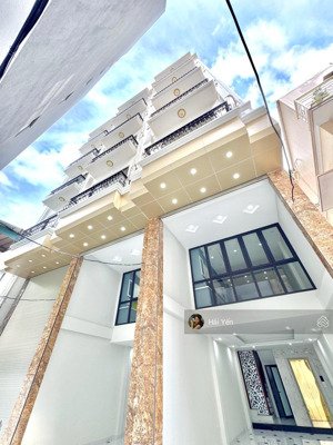 siêu phẩm định công thượng - 7 tầng thang máy - mặt tiền 4m - ô tô vào nhà - ngõ rộng thoáng