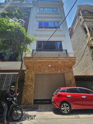 bán nhà hào nam , 52m2 7 tầng thang máy , ô tô tránh , nhà mới , 21 tỷ