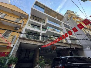 bán toà 9 tầng, mới, đẹp, văn phòng, kinh doanh, em mặt phố trần thái tông, 125m2, mt:8m, 89 tỷ