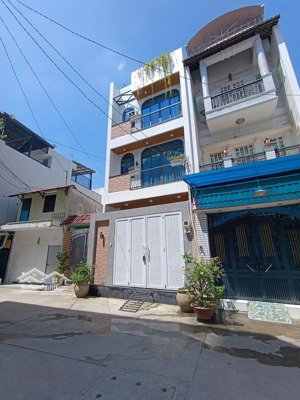 gần bv ung bướu ! bán nhà lê quang định p7 (5x14m cn 69,9m2 ) hẻm xe hơi - 2 tầng cũ tiện cải tạo