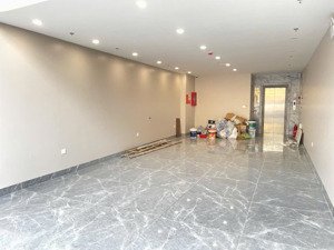 cho thuê toà nhà 90m2*8 tầng mặt phố trần quý cáp, đống đa