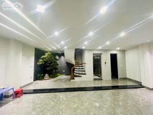 Bán nhà Đàm Quang Trung 58m2 lô góc oto vào nhà 7 tầng thang máy 23.3 tỷ