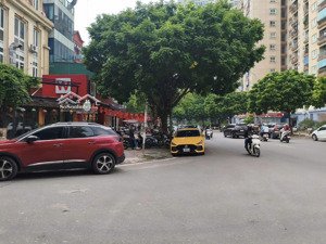 bán toà nhà 6 tầng lô góc mp vũ phạm hàm - nguyễn bá khoản, cg , dt 105m mt 7.2m, vỉa hè 3m 57 tỷ .