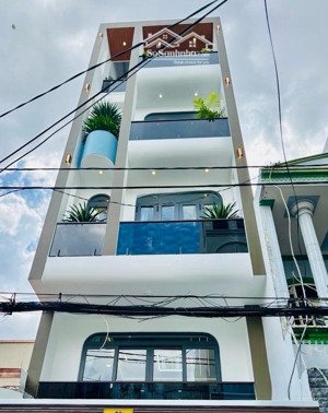 lê văn thọ gò vấp- xe hơi ngủ trong nhà - 5 tầng 56m2 ( 4*14) 56m2 10,9tỷ.lh 