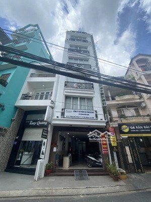 tòa nhà 7 tầng ngay trục phan đăng lưu. khai thác văn phòng & chdv lợi nhuận cao