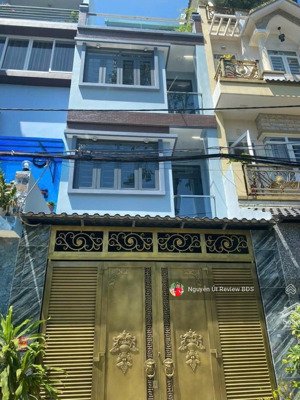 nhà 4 tầng có thang máy lê văn quới gần ngã tư bốn xã chỉ 7 tỷ