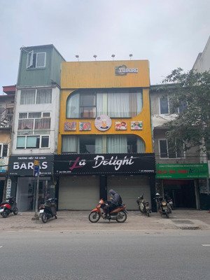 cho thuê nhà mặt phố trần nhân tông: dt 80m2 x 2 tầng, mt 6m, nhà mới, thông sàn, giá 55 tr/th