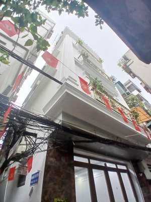 bán nhà mặt ngõ phố kim mã,ba đình 40m x 5 tầng lô góc cách phố chính 15 m giá bán 9,5 tỷ