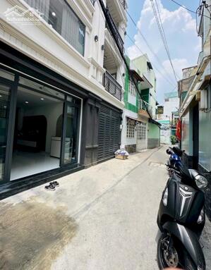 Ô TÔ ĐỖ CỬA, NHÀ MỚI 5 Tầng 3PN 40m2, P10 Gò Vấp, giá nhỉnh 7ty