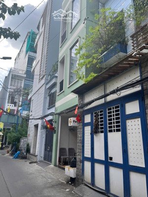 nhà mới xây trung tâm quận 10, 4tầng, giá 15 tỉ.