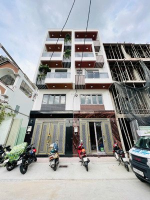 dãy nhà siêu phẩm lê trọng tấn- 4m*17m đúc 4,5 tấm- hẻm 10m- thang máy 450kg- nội thất cao cấp