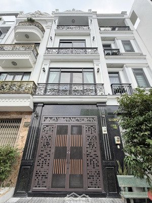 nhà mới thiết kế đẹp 100% 3 lầu đường 7m bà hom q.6