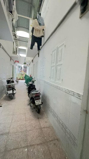 bán nhà trọ 2 kiot và 14 phòng, dt 10x30, shr, tại kdc thuận giao