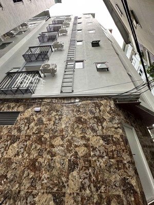 bán tòa chdv lê đức thọ, lô góc- thang máy- 11 phòng khép kín- ô tô đỗ cửa, dt 50m2-7 tầng- mt 4m2