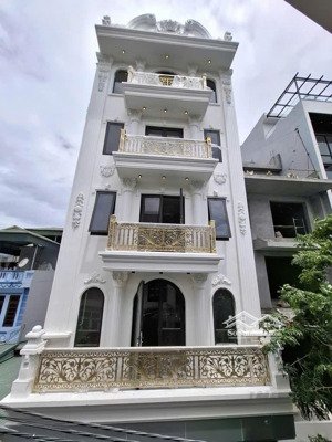 nhà mới xây phố trạm 75m2, mt 6m, 7 tầng, thang máy, lô góc, đường rộng, ô tô tránh, giá hơn 23 tỷ