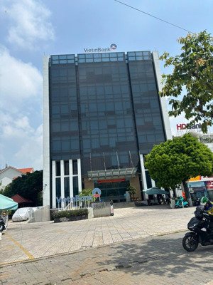 hạ giá bán tòa nhà mặt tiền nơ trang long, quận bình thạnh - dt 15x50m - hầm 8 tầng - giá 95 tỷ