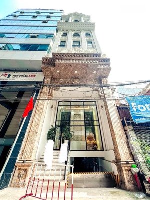 tòa văn phòng 9 tầng lê đức thọ - ô tô tránh - vỉa hè rộng - 160m2 x 9 tầng - 69.8 tỷ