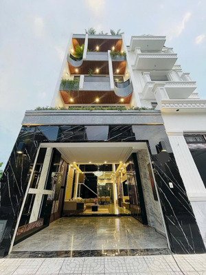 tuyệt phẩm nhà phố hiện đại - có thang máy kdc -quận 7..! view công viên - ven sông