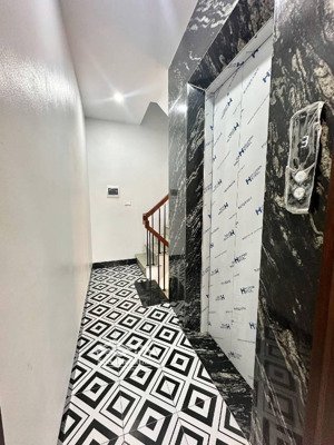 nhà mới an dương vương- thang máy- 3 bước ra ô tô.