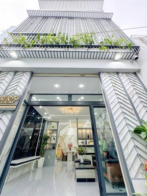 tôi bán nhà sd 106 m2, 1 trệt 1 lầu, sổ hồng riêng, tuyệt đẹp, quận 7, giá: 6,3 tỷ