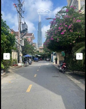 nhà ngay mặt tiền trần não - lương đình của an khánh quận 2 ngang 6m dài 23m xây 7 tầng giá 33 tỷ