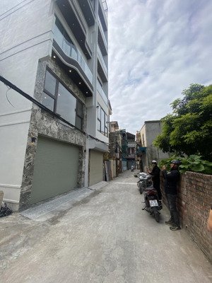 bán nhà 6 tầng phố thạch bàn có thang máy gara ô tô ngõ rộng thoáng giá 13.5 tỷ