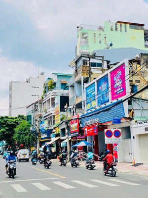 bán nhà 6 tầng có thang máy ngay mặt tiền lê quang định, 99m2, giá bán 18,5 tỷ tl