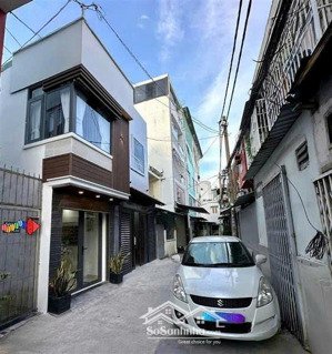 phú nhuận- hxh 7 chỗ kinh doanh căn góc 2 mt nhà mới lung linh sổ nở hậu