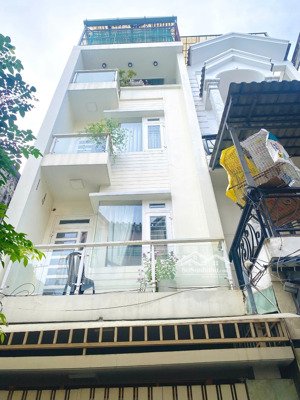 nhà 2 mặt tiền trước và sau đường quang trung p8 hẻm 6m dt 4x16 đúc kiên cố 3 lầu