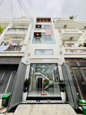 nhà phố 1 lửng 3 lầu 1/ hẻm nhựa xe hơi lê văn khương