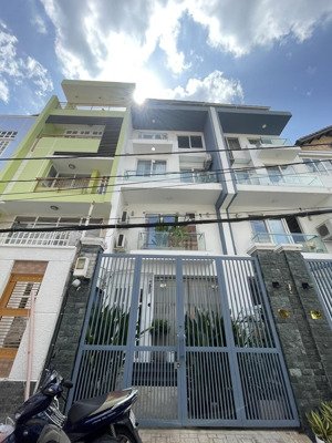 cho thuê nhà mới 1 trệt 4 lầu khu làng báo chí-gía 26tr/tháng