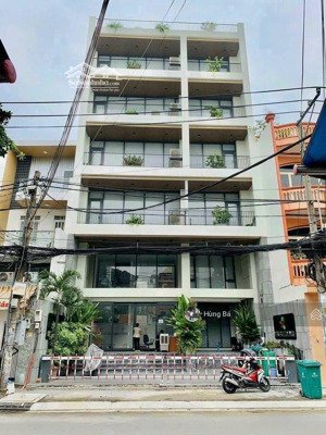 bán gấp ! tòa nhà góc 2 mặt tiền hà huy giáp - dt: 19 x 29m - 7 tầng - hđt: 230 tr. giá chỉ 55 tỷ