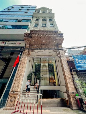 bán tòa văn phòng đường lê đức thọ - nguyễn hoàng, 160m2 x 9t. mt 6.5m. 69.5 tỷ, 3 ô tô tránh