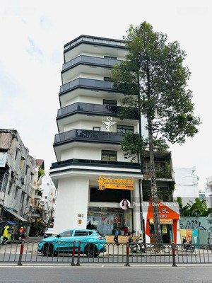 nợ bán gấp - tòa nhà góc 2mt ngay 3 tháng 2, q.10 - dt: 20 x 15m - hầm 7tầng - hđ 300 tr/th - 67 tỷ